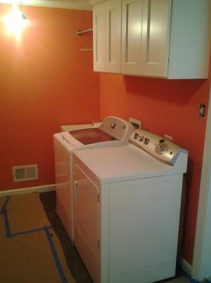 Our laundry room: Sherwin-Williams Coral Reef